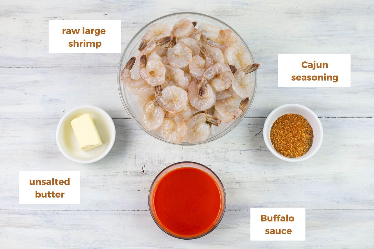 Buffalo shrimp recipe ingredients in small bowls.