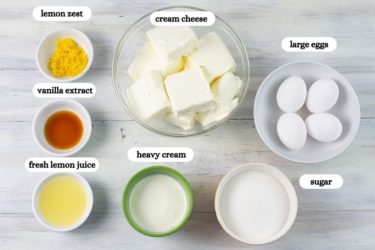 Lemon cheesecake filling ingredients measured in small bowls.