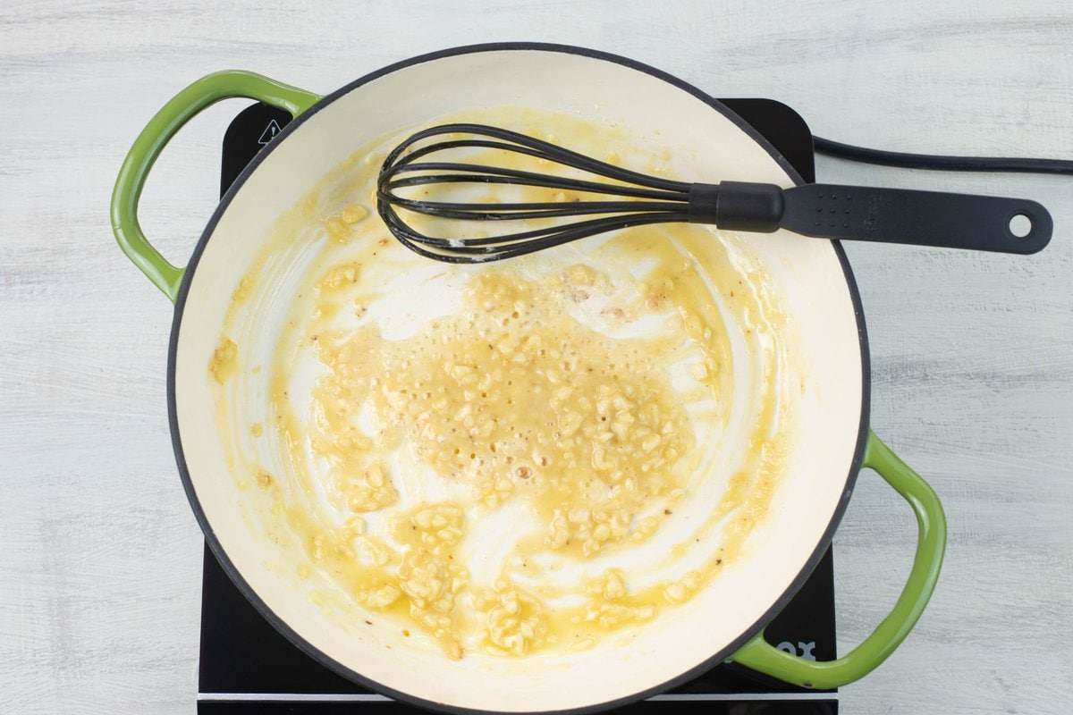 Melted butter, flour and minced garlic in a skillet.