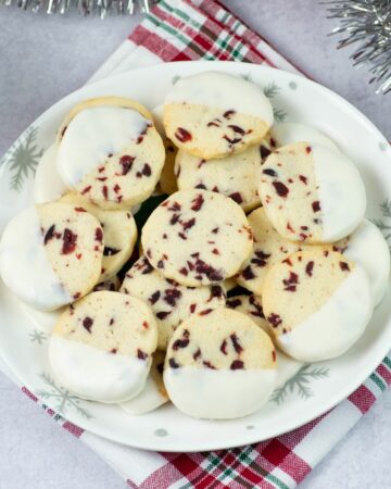 Cranberry Christmas Cookies arranged on a holiday plate.