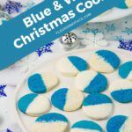 Blue and white Christmas cookies on a plate.