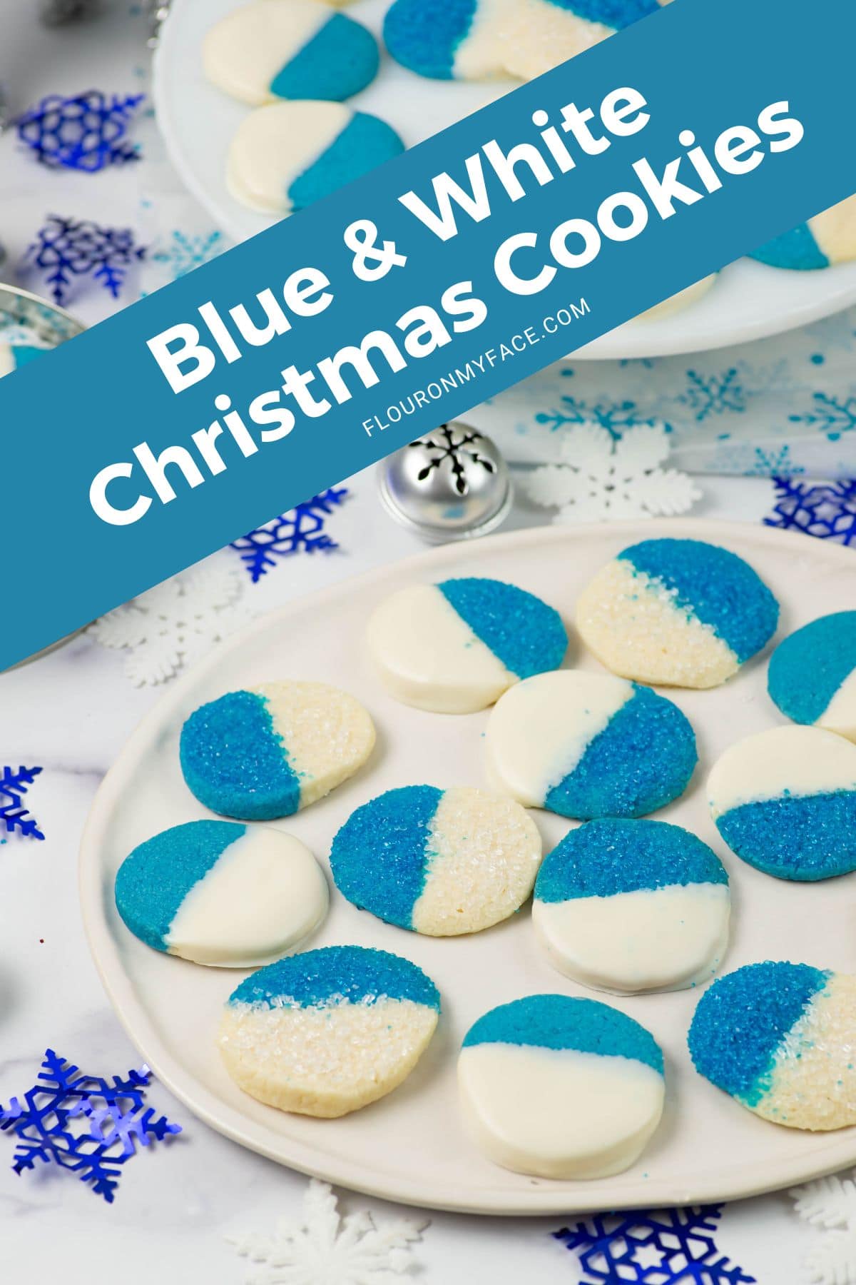 Blue and white Christmas cookies on a plate.