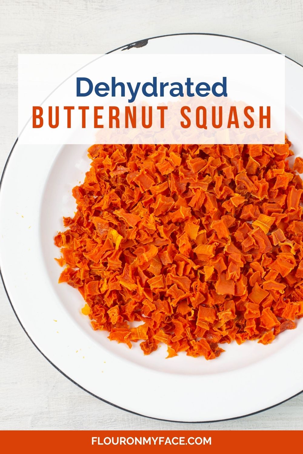 Large enamel bowl filled with dehydrated butternut squash.