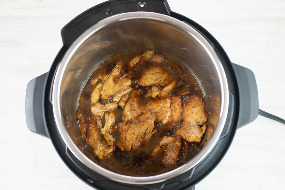 The cooked chicken adobo before thickening the sauce.