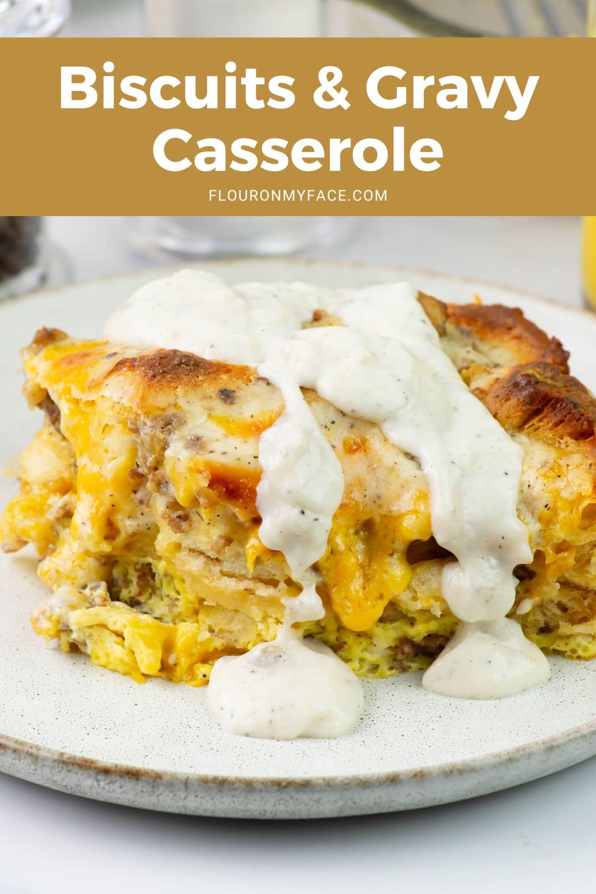 Large vertical image of a slice of breakfast casserole on a plate.