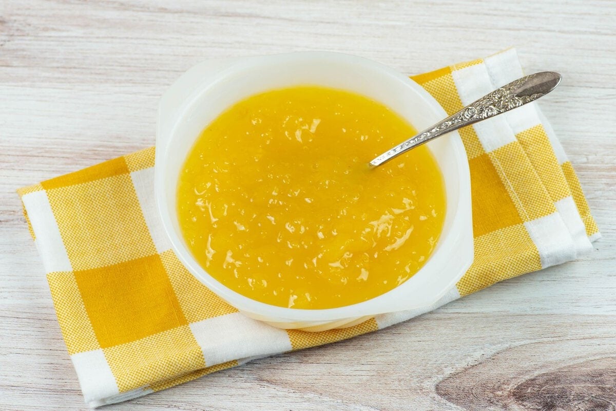Homemade tropical dessert sauce in a small bowl.