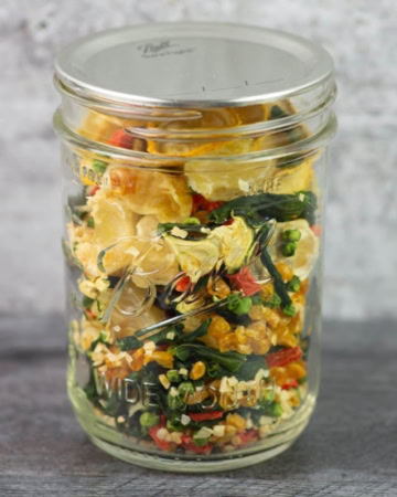 Mason jar filled with dried soup mix.