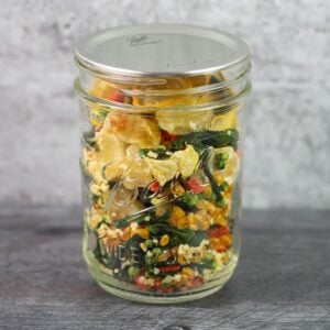 Mason jar filled with dried soup mix.