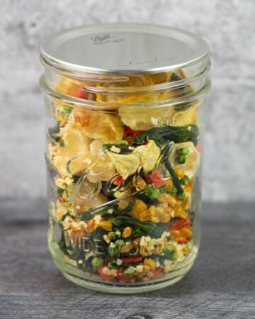 Mason jar filled with dried soup mix.