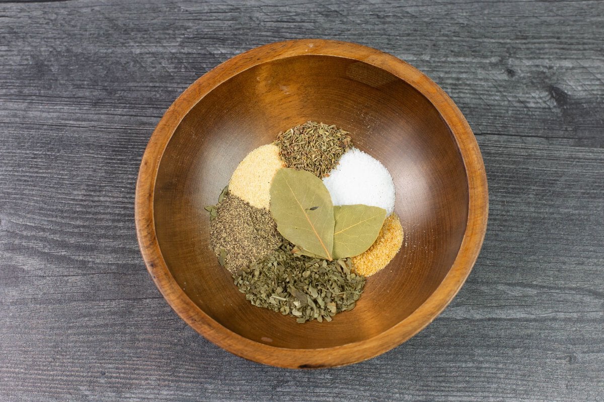 Soup spice seasonings in a wooden bowl.