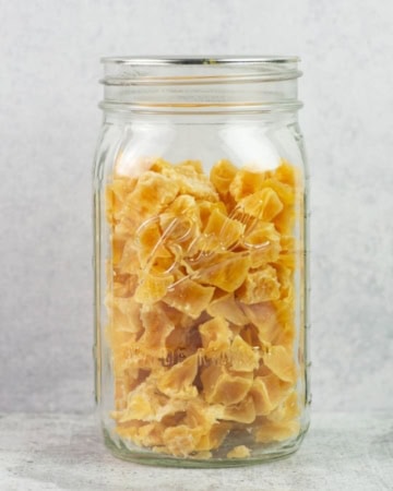 Dehydrated cubed potatoes in a mason jar.