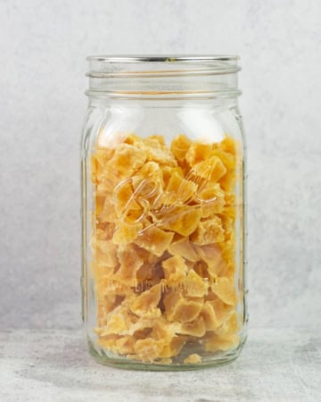 Dehydrated cubed potatoes in a mason jar.