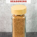 Closeup of spice jar filled with all-purpose pork chop seasoning mix.