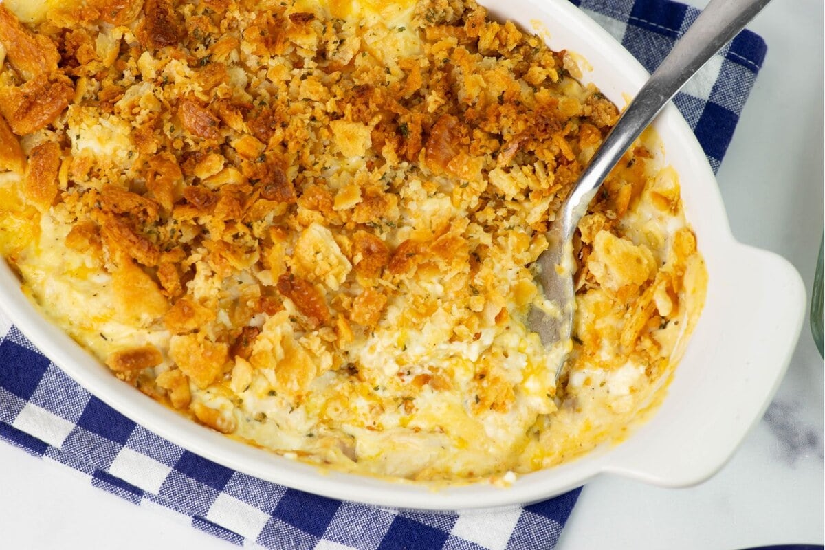 Casserole dish with a scoop served.