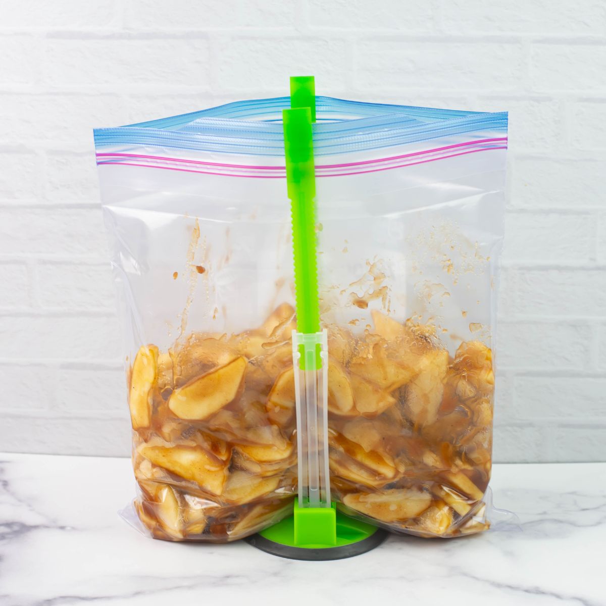 Bag stand with freezer bag held up.