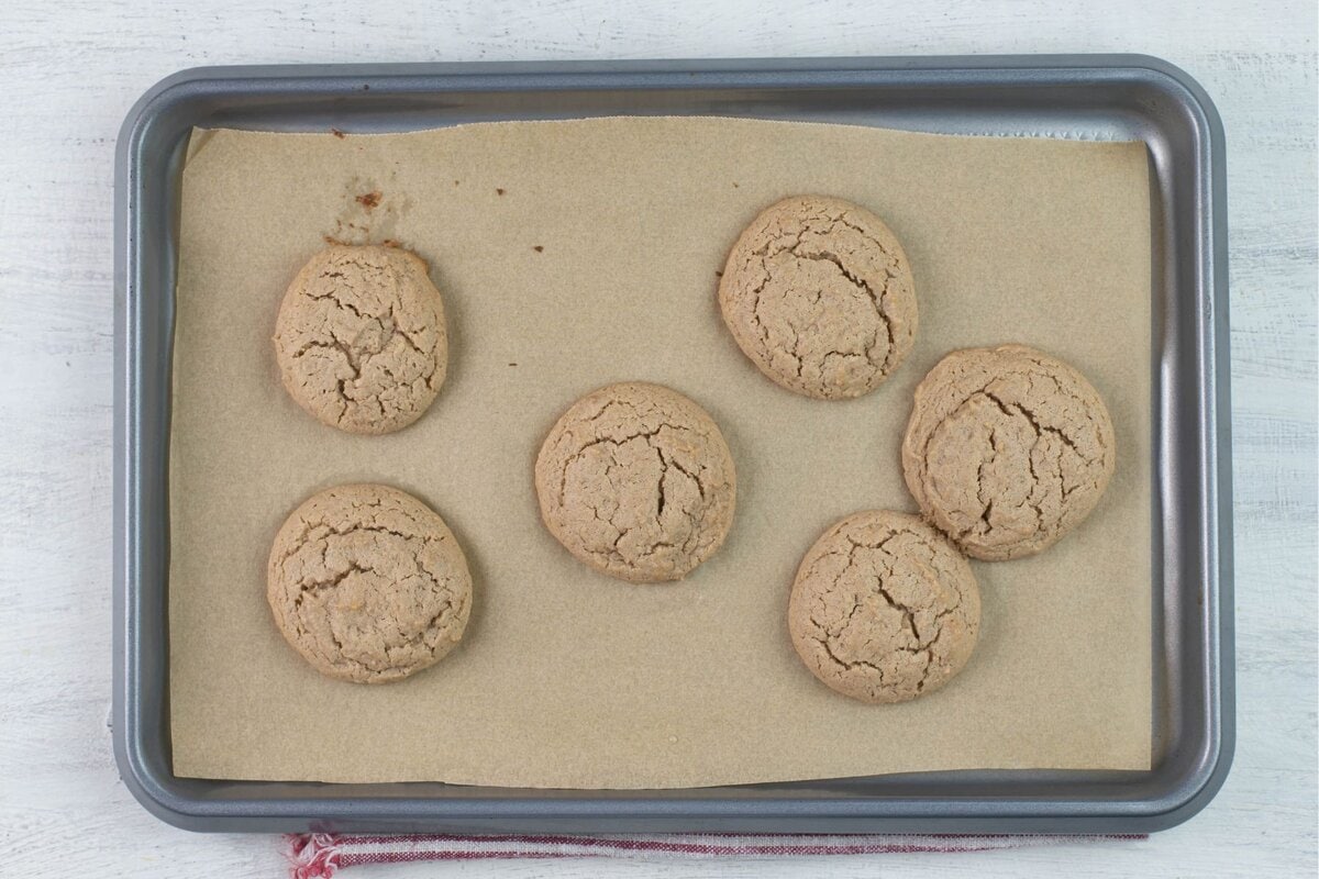 Cookie sheet with fresh baked spiced cookies.