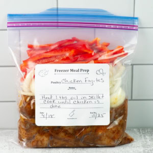 Zip topped bag filled with chicken fajita ingredients.