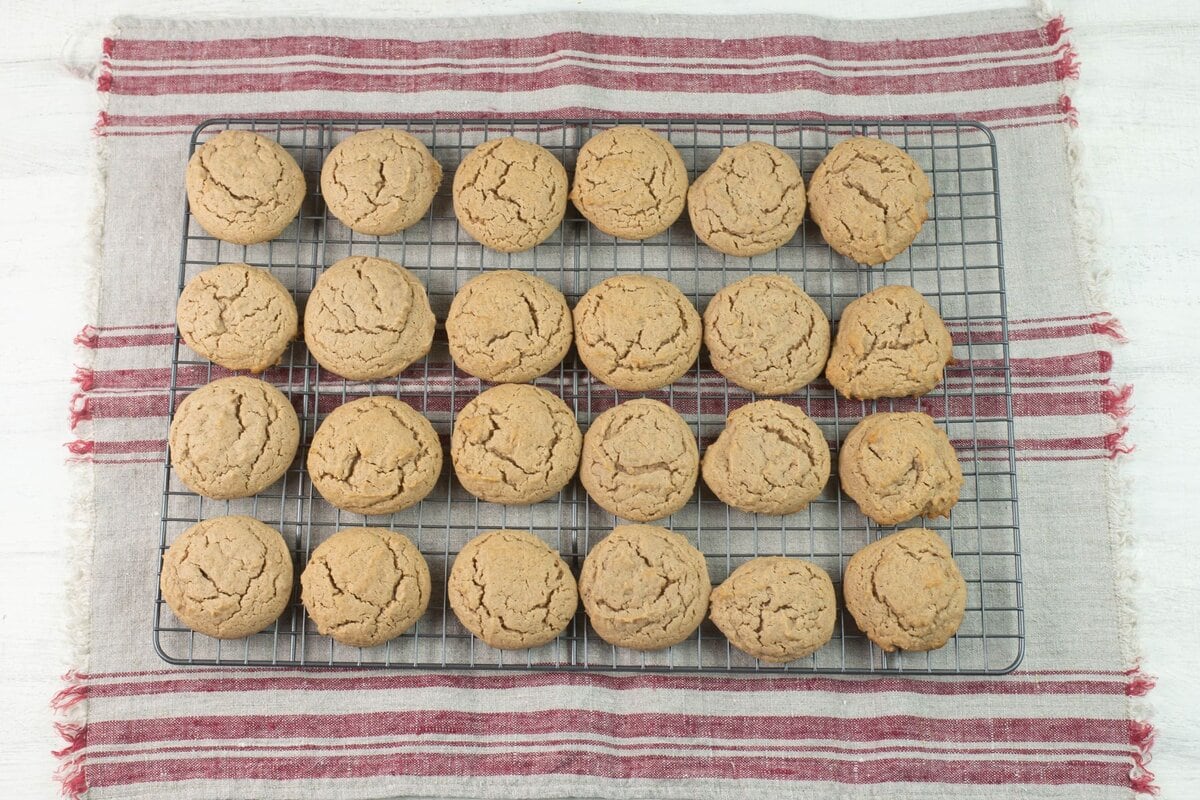 Hot cookies cooling on a wire cooling rack.