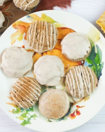 Spice cookies arranged on plates.