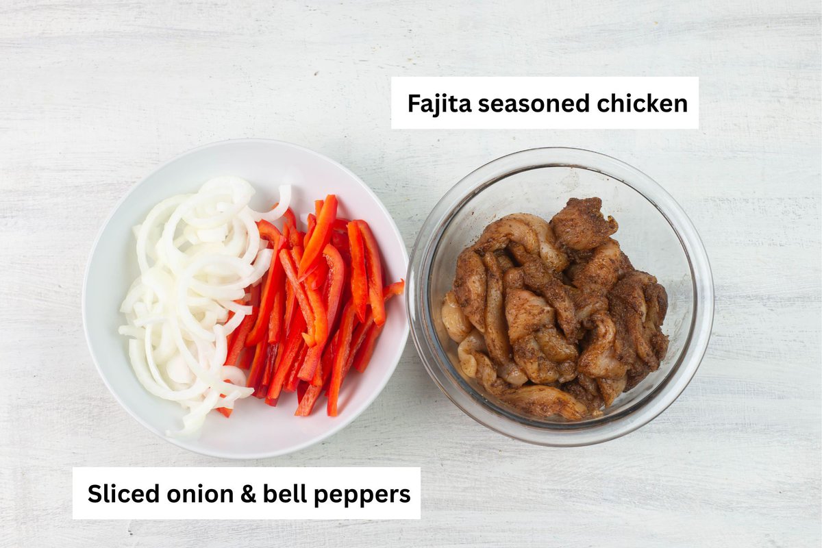 2 bowls filled with seasoned chicken and sliced onion and red bell pepper.
