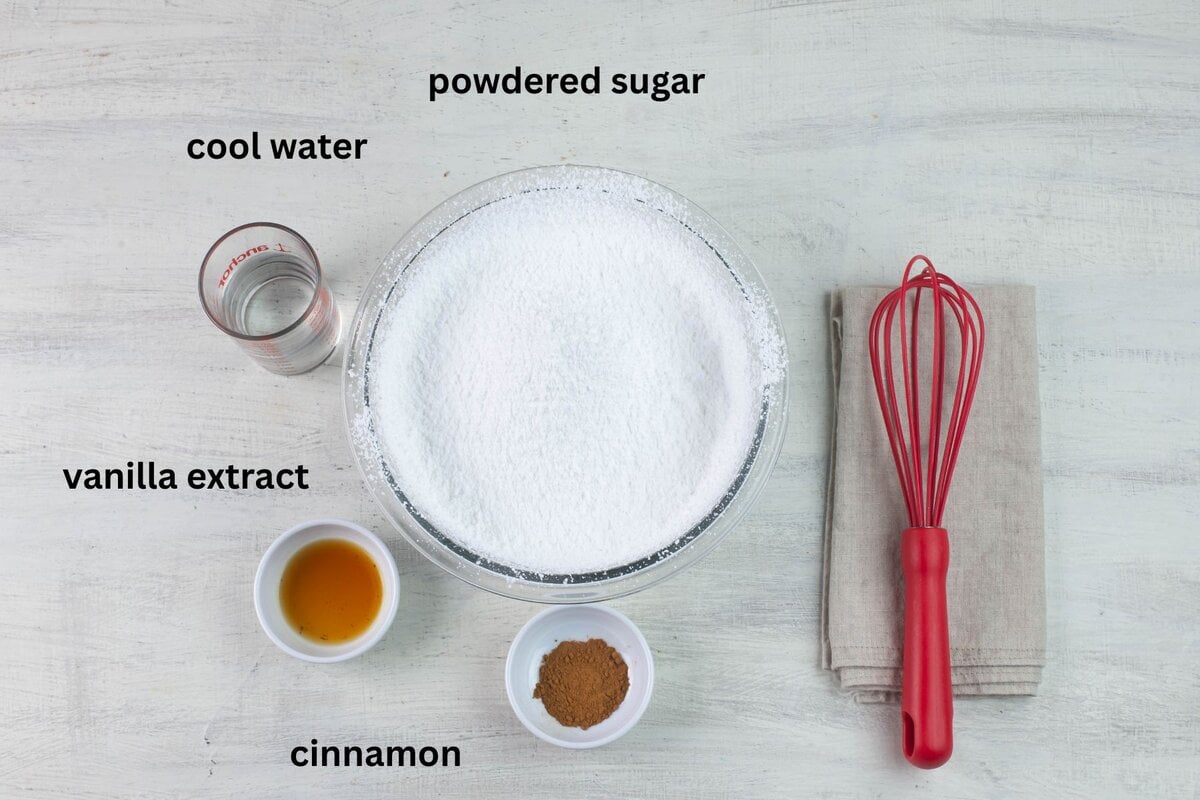 Powdered sugar, water, vanilla and cinnamon icing ingredients. 