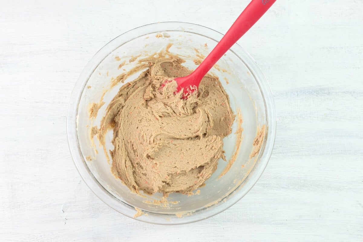 Thick cookie batter in a bowl.