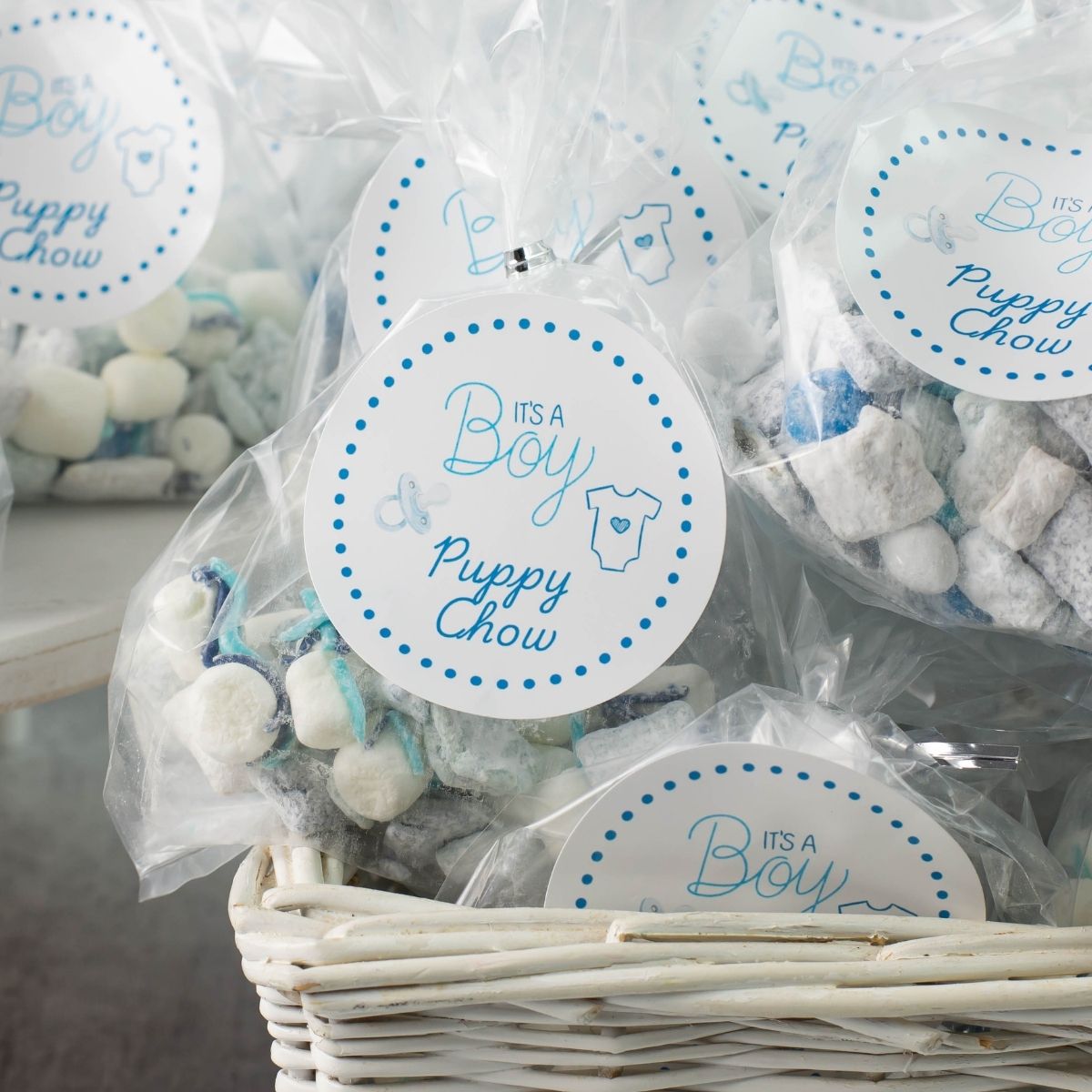 Its a boy Puppy Chow treat labels attached to bags of puppy chow.