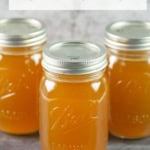 3 jars filled with homemade broth.