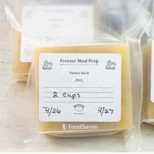 Frozen blocks of broth in vacuum sealed bags.