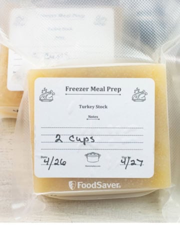 Frozen blocks of broth in vacuum sealed bags.